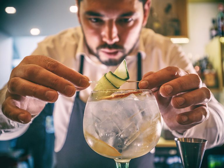 bartender preparing a gin drink
