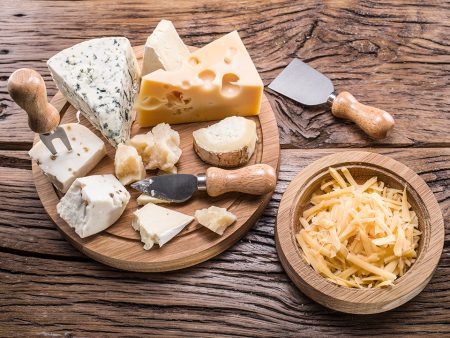 board with variety of cheeses