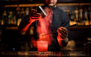 mixologist preparing a cocktail
